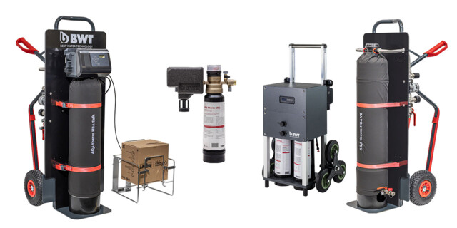 A selection of BWT mobile water filtration systems, featuring robust cylindrical units on wheeled carts for easy transport.