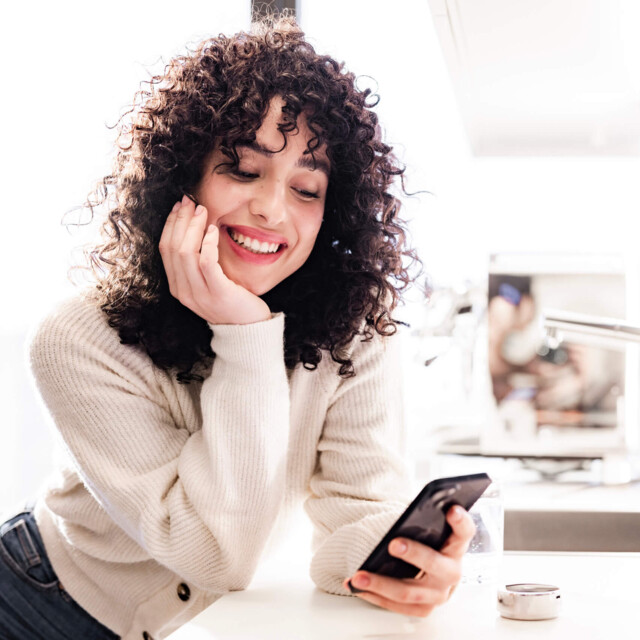 Woman with cell phone in hand