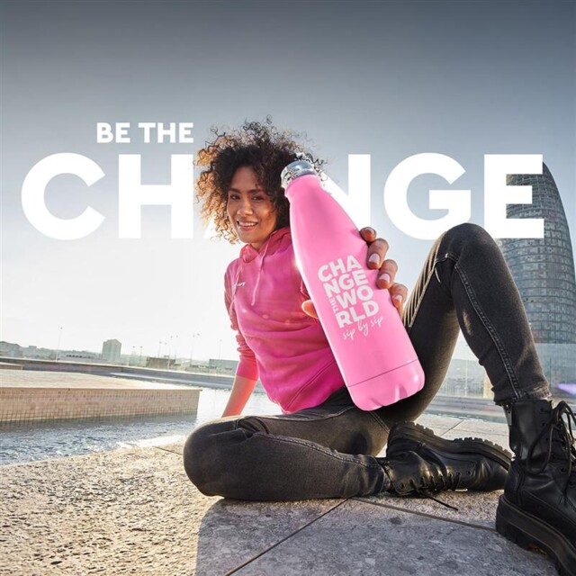 Woman with water bottle and text "Be the Change"